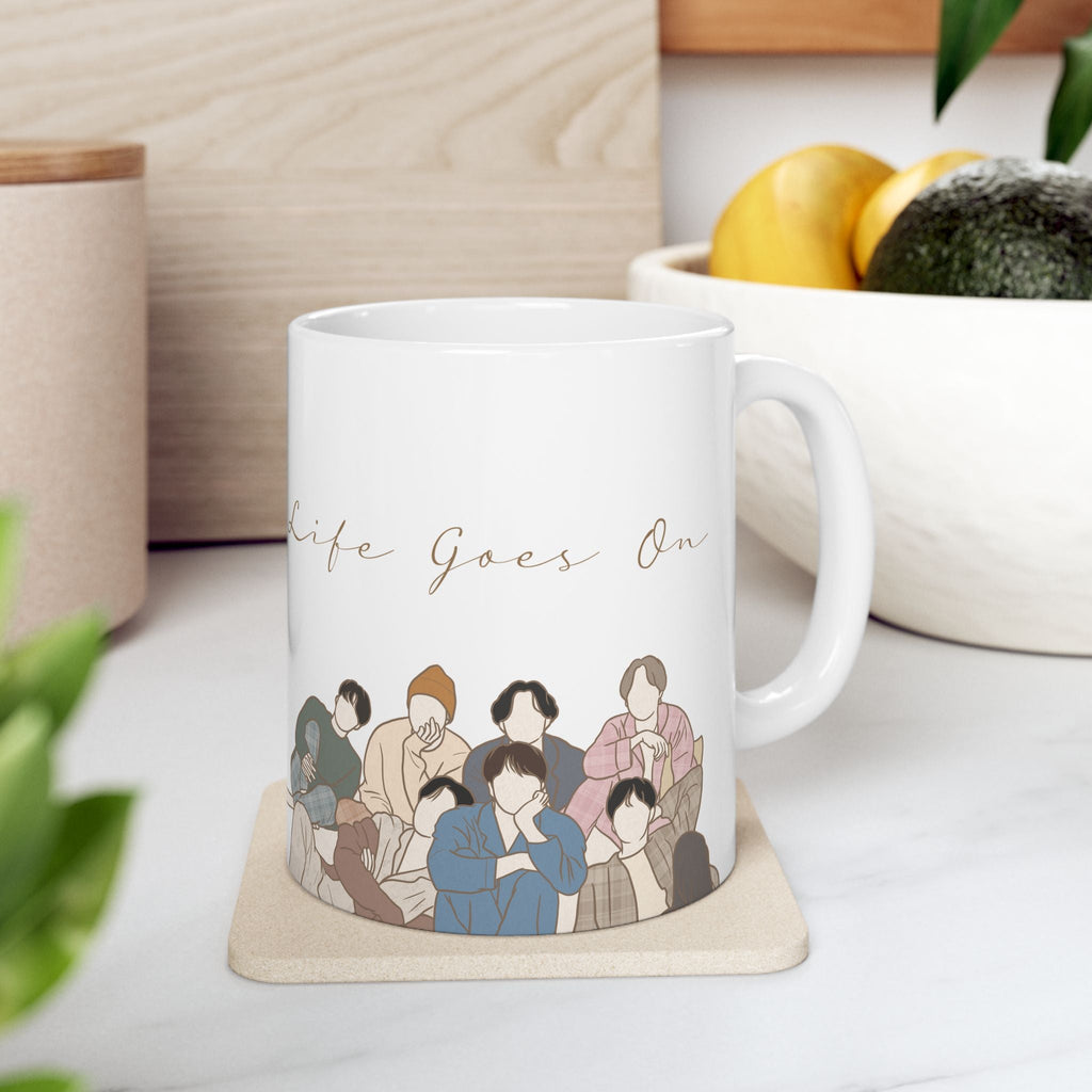 BTS fanart mug featuring Life Goes On theme with illustrated members sitting together – Kpop ceramic drinkware